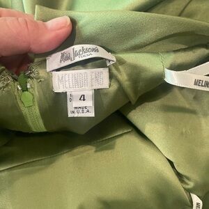 Green satin Melinda Eng, floor length evening gown.  Size 4